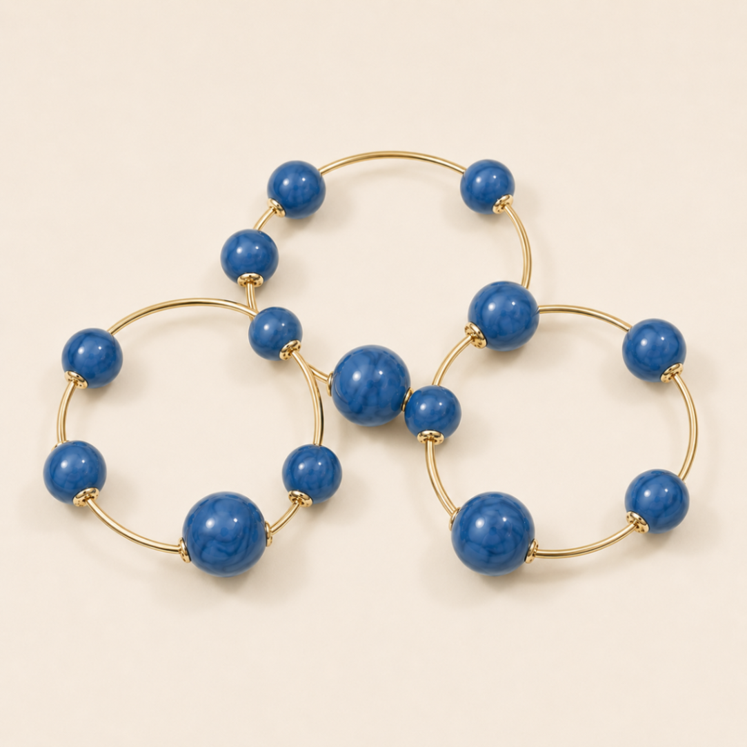 PULSERAS BOLITAS AZULES CON DORADO